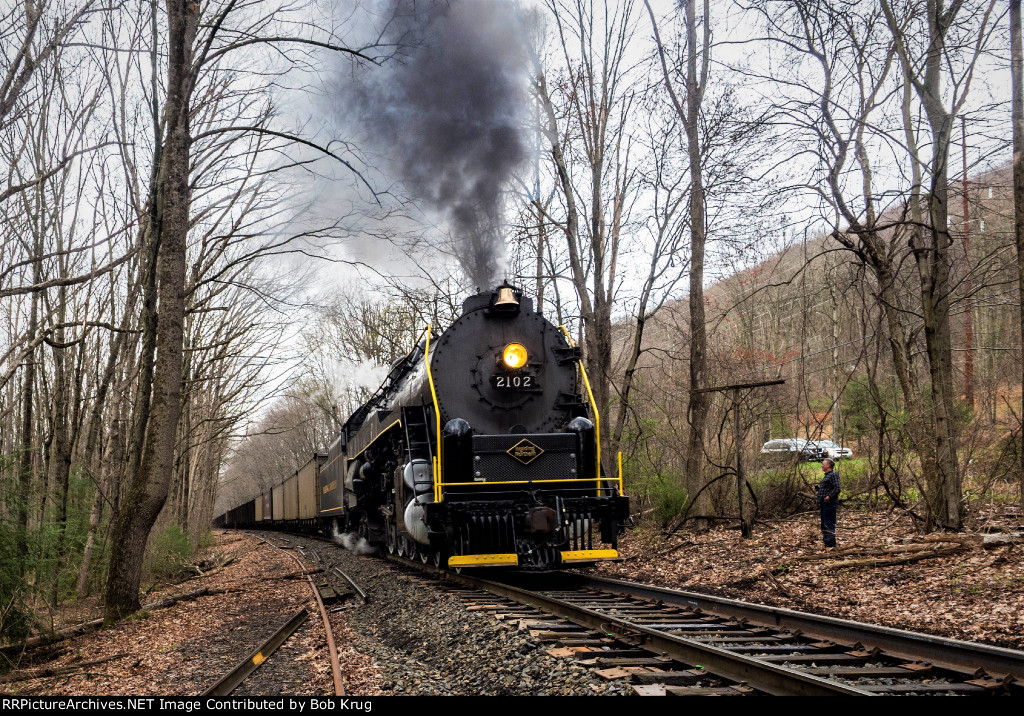 RBMN 2102 westbound in the woods above Lake Hauto on the hometown hill grade